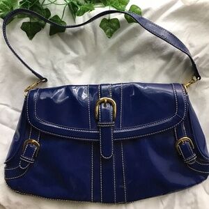 Blue shoulder bag with cheetah print interior